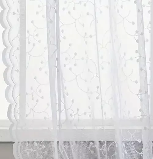 Jacquard függöny anyag közelről, raschel technikával szőtt mintázattal